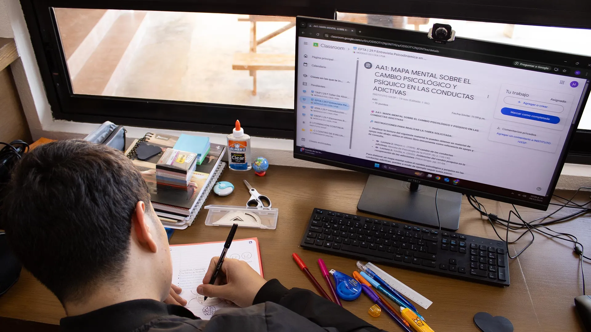 Resident studying at a computer