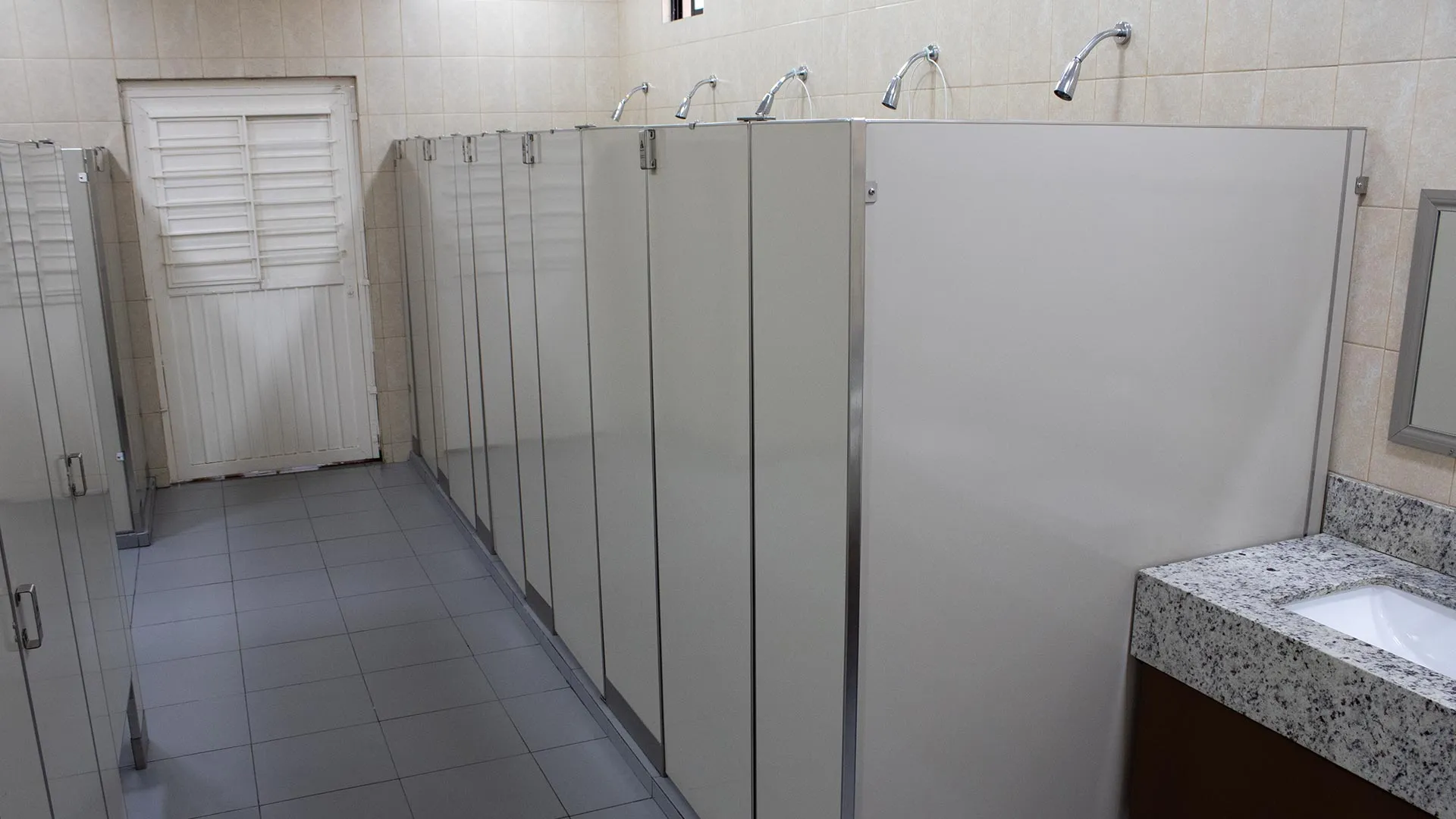 Shower area with glass enclosures
